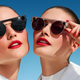 Two models wear different styles of Snap’s Spectacles 3 smart glasses.